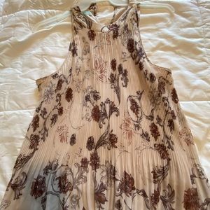 2 sleeveless blouses